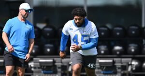 Read more about the article Tuli Tuipulotu continues his training camp hold in as he chases new Chargers deal