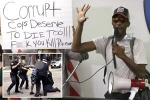 Read more about the article Wisconsin anti-cop protesters flash sign threatening to kill police chief at press conference for shooting — as he stands idly by