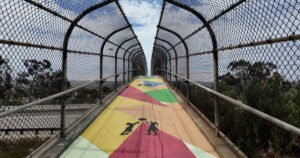 Read more about the article Can glow-in-the-dark paint make a pedestrian bridge safer? Caltrans thinks so
