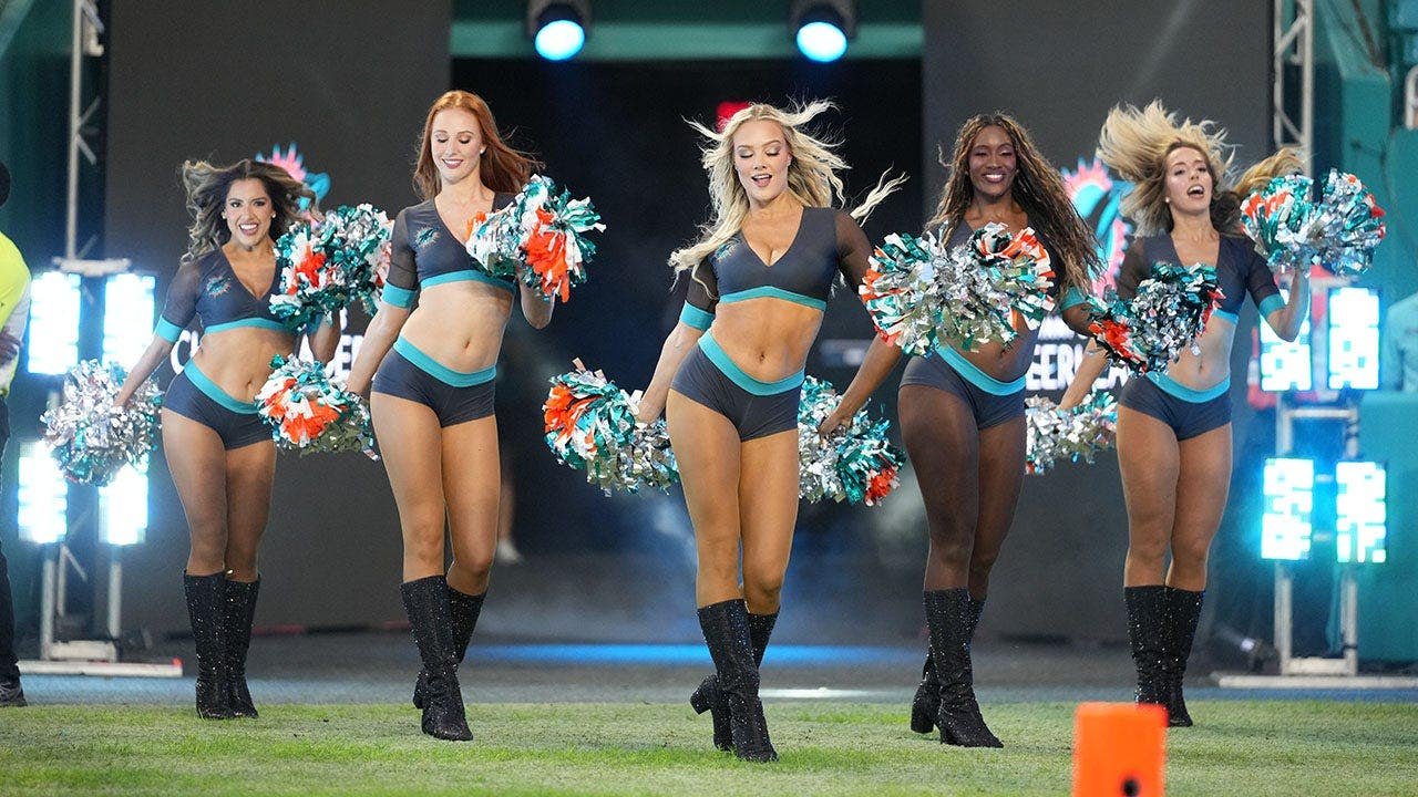 You are currently viewing Dolphins cheerleaders reveal new uniforms as rivalry with Cowboys ramps up, Romo DUI memes & Vrabel’s puppy