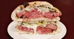 Read more about the article ‘It looks like a war.’ How a $38 Armenian brisket sandwich ignited debate over culture and cost