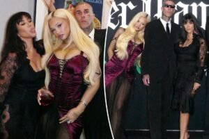 Read more about the article Kourtney Kardashian and Alabama Barker channel Addams Family vibes in corseted satin and lace