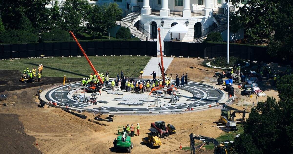 Read more about the article Trump plays White House tour guide to show off work on his helipad and ballroom
