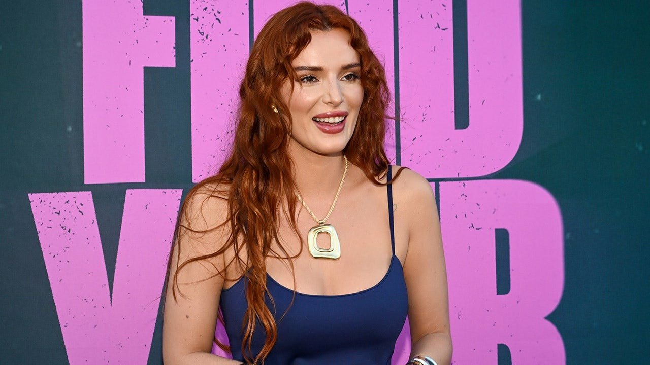 You are currently viewing Bella Thorne hits the beach in green bikini with fiancé Mark Emms