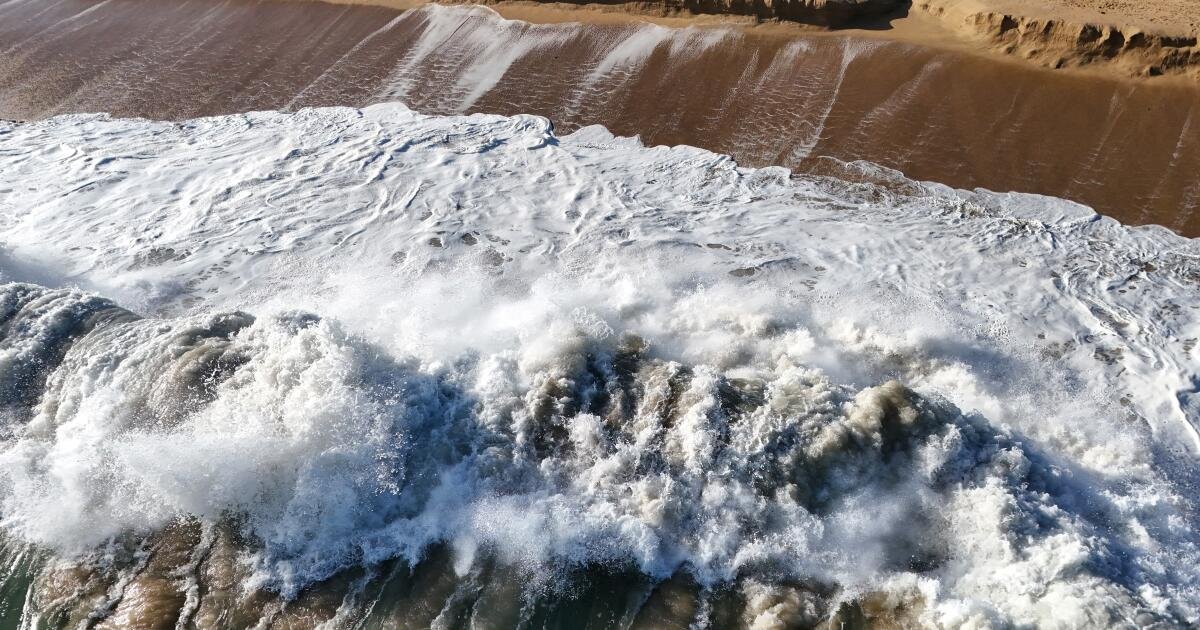 You are currently viewing Stripped of sand, decades-old infrastructure ‘relics’ pop up at the Wedge in Newport Beach