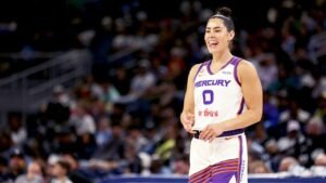 Read more about the article Social media explodes as WNBA star Kelsey Plum leaps into the arms of opposing coach during play