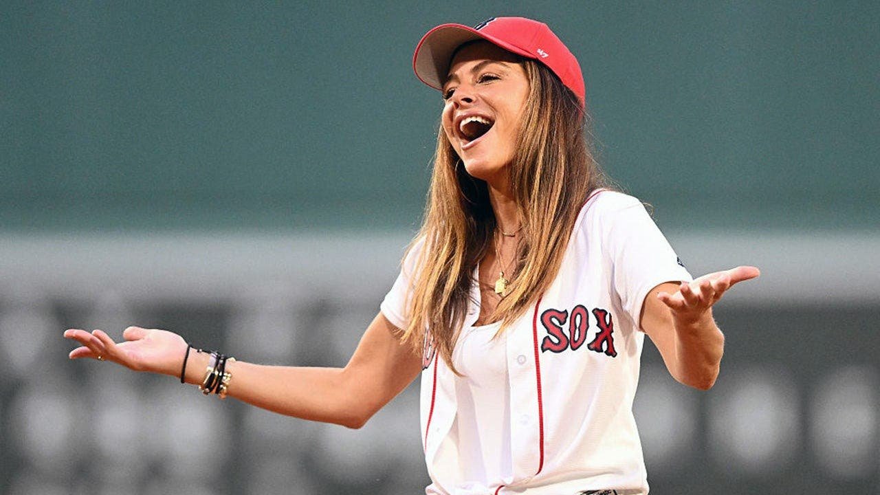 Read more about the article Maria Menounos nails first pitch at Fenway, Shane Gillis gets busted & is Amanda Anisimova drinking beer?