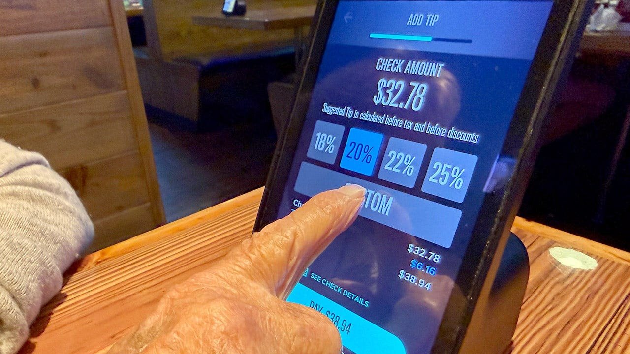 You are currently viewing Digital tip screens are designed to pressure customers into tipping