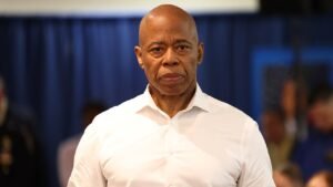 Read more about the article Eric Adams faces ‘You belong in prison!’ chants during AI data center pitch